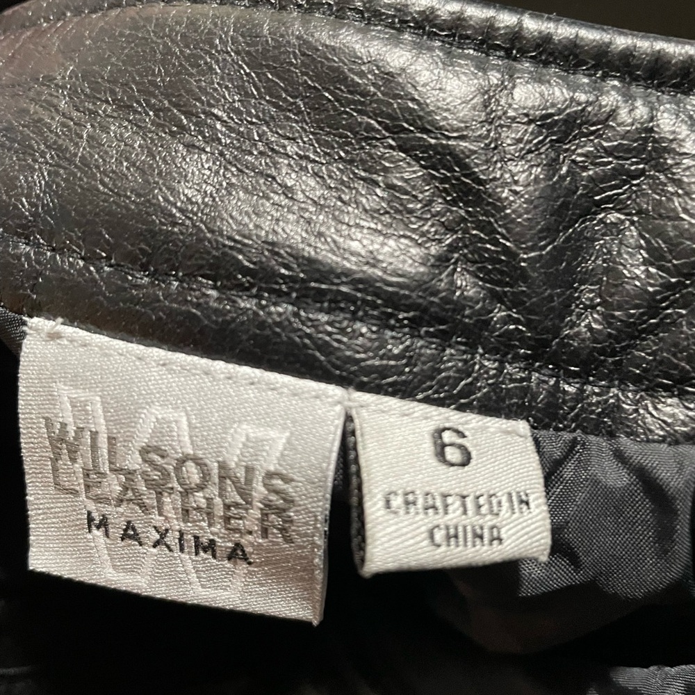 Woman’s black leather pants